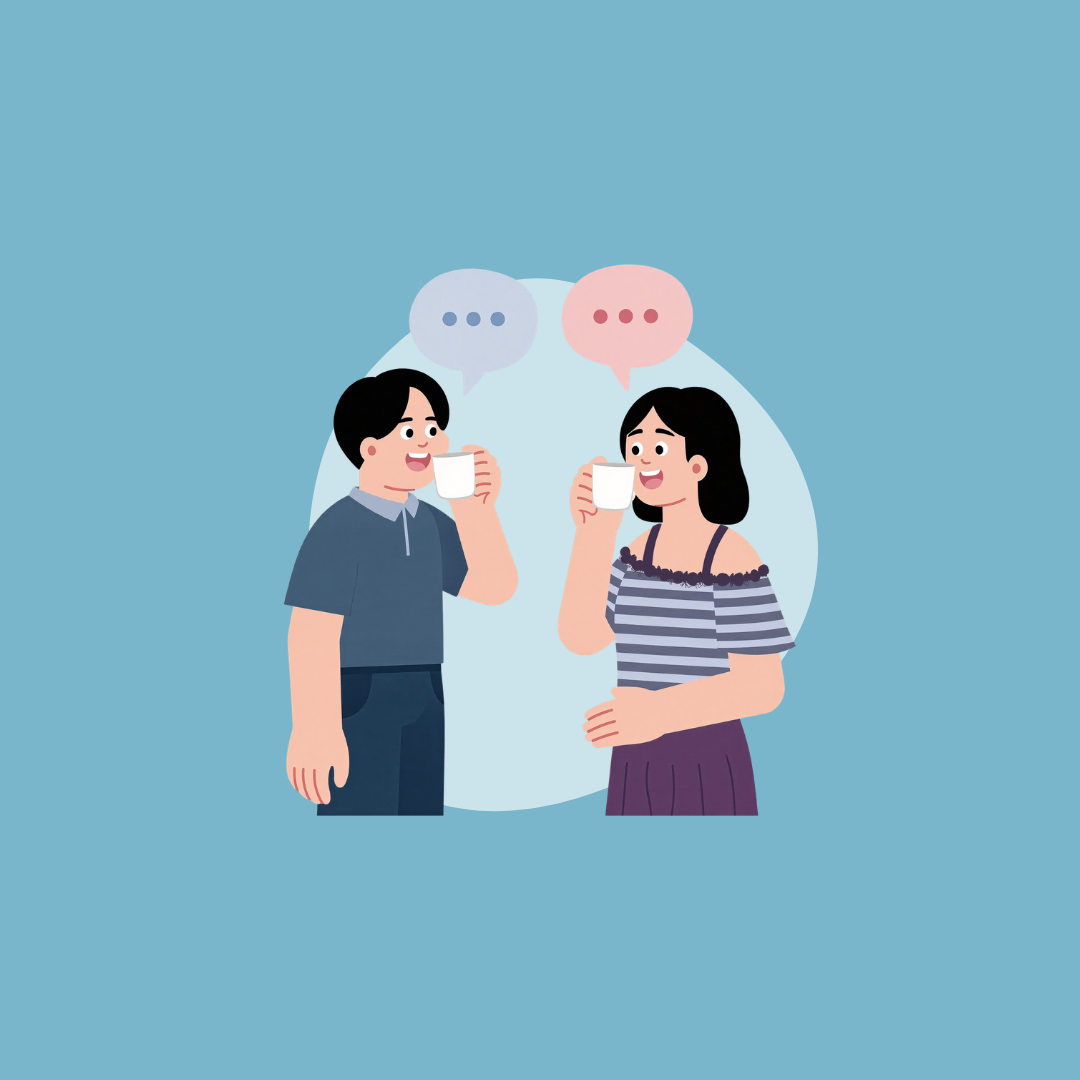 Two people sipping coffee having a discussion